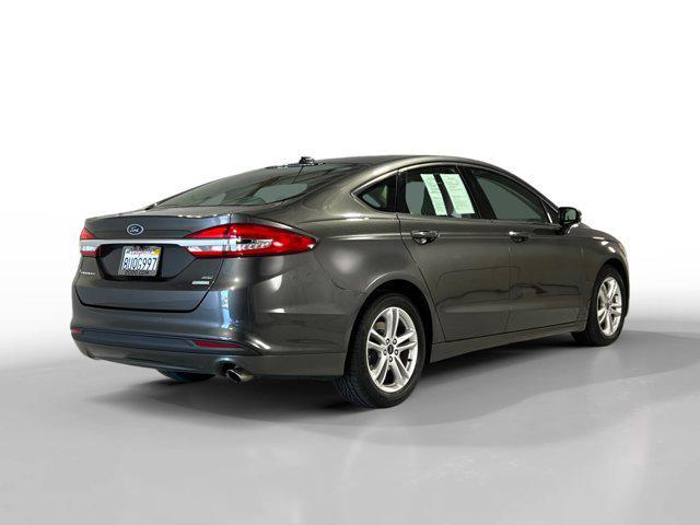 used 2018 Ford Fusion car, priced at $13,999