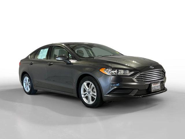 used 2018 Ford Fusion car, priced at $13,999