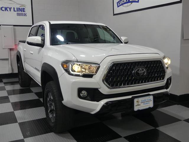 used 2018 Toyota Tacoma car, priced at $27,499