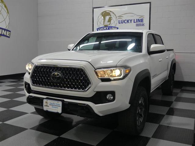 used 2018 Toyota Tacoma car, priced at $27,499