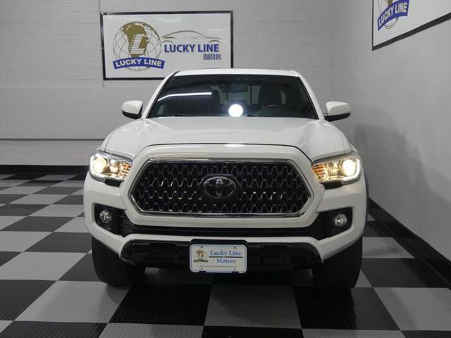 used 2018 Toyota Tacoma car, priced at $27,499