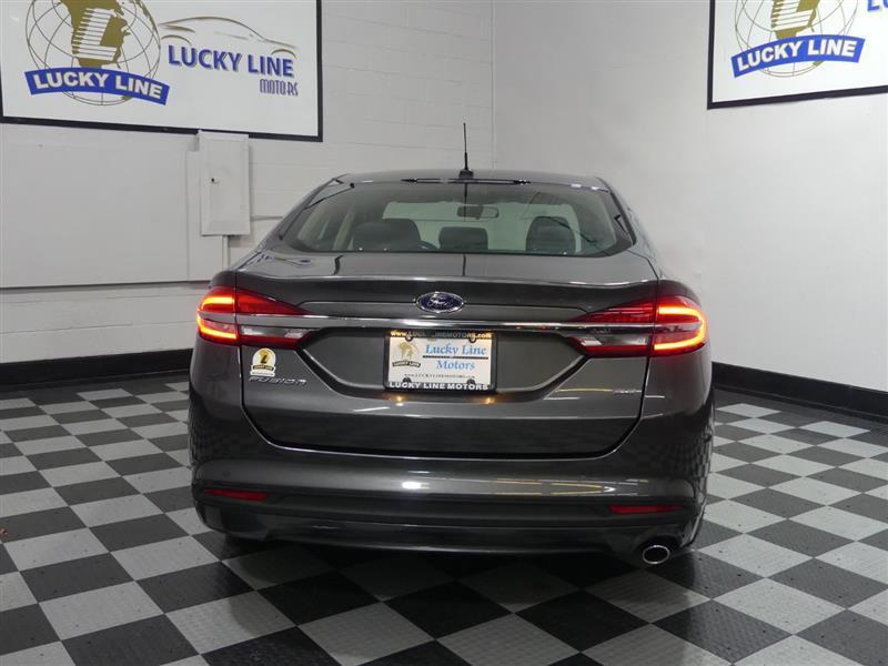 used 2018 Ford Fusion car, priced at $13,499