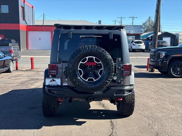 used 2016 Jeep Wrangler Unlimited car, priced at $19,493