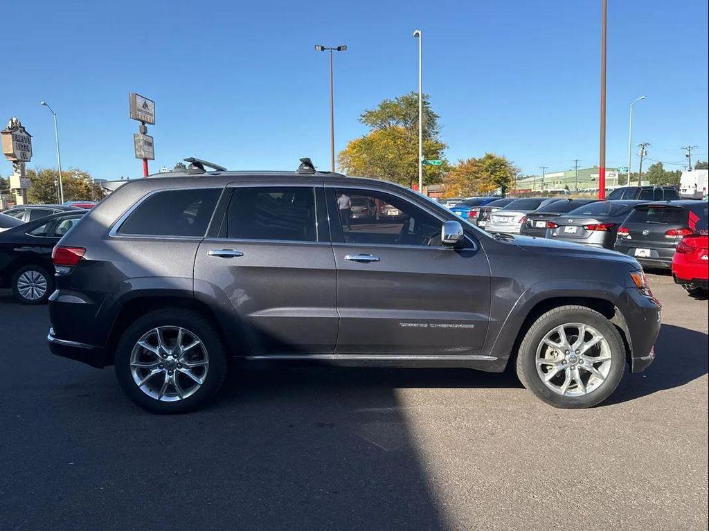 used 2014 Jeep Grand Cherokee car, priced at $13,393