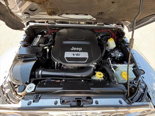 used 2014 Jeep Wrangler car, priced at $17,499
