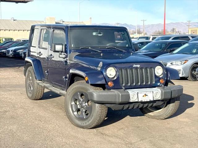 used 2013 Jeep Wrangler Unlimited car, priced at $15,699