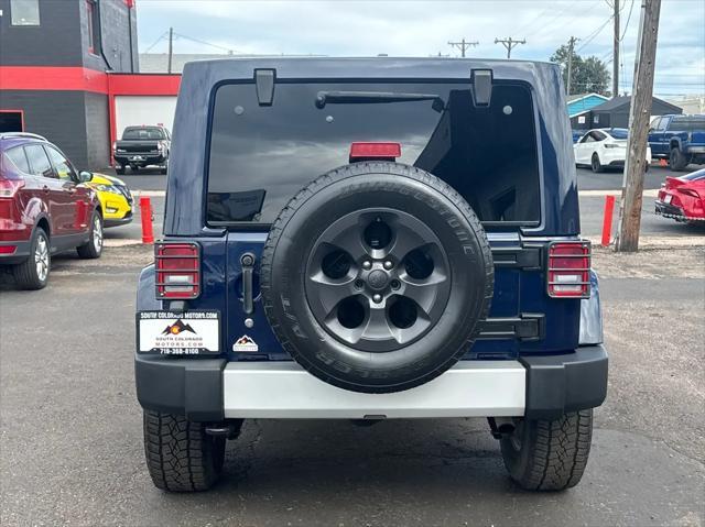 used 2013 Jeep Wrangler Unlimited car, priced at $16,599