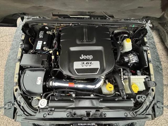 used 2012 Jeep Wrangler Unlimited car, priced at $16,992