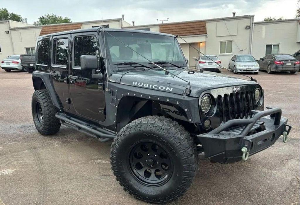 used 2012 Jeep Wrangler Unlimited car, priced at $15,899