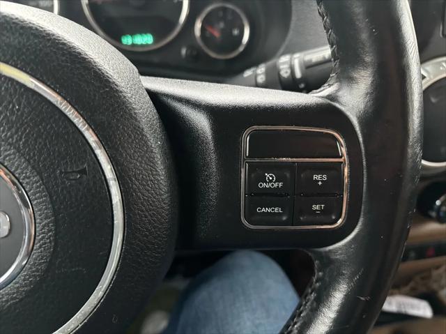 used 2012 Jeep Wrangler Unlimited car, priced at $16,992