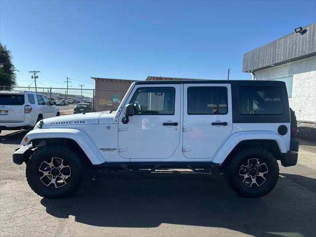 used 2012 Jeep Wrangler Unlimited car, priced at $19,493