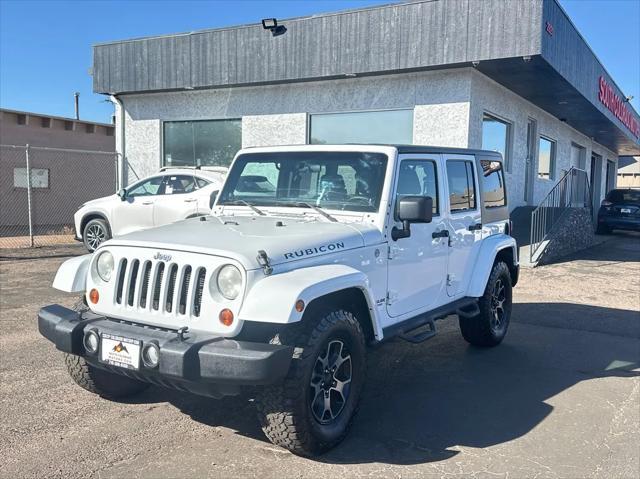 used 2012 Jeep Wrangler Unlimited car, priced at $19,493