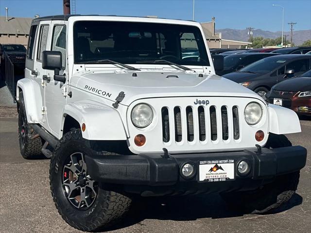 used 2012 Jeep Wrangler Unlimited car, priced at $19,493