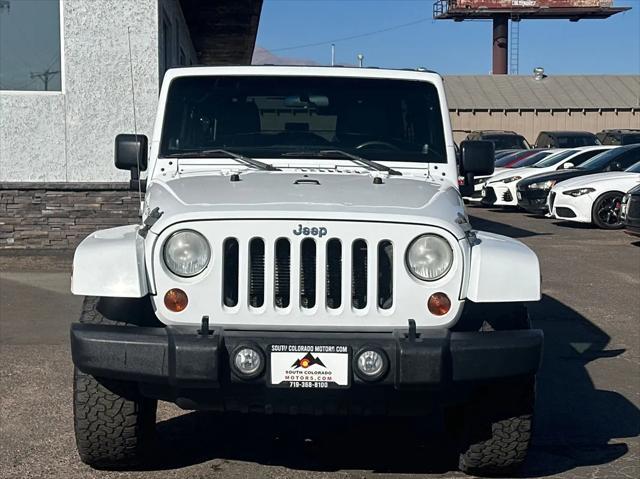 used 2012 Jeep Wrangler Unlimited car, priced at $19,493