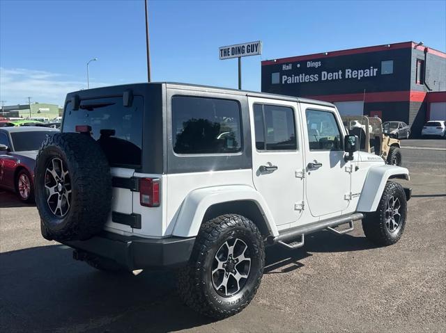 used 2012 Jeep Wrangler Unlimited car, priced at $19,493