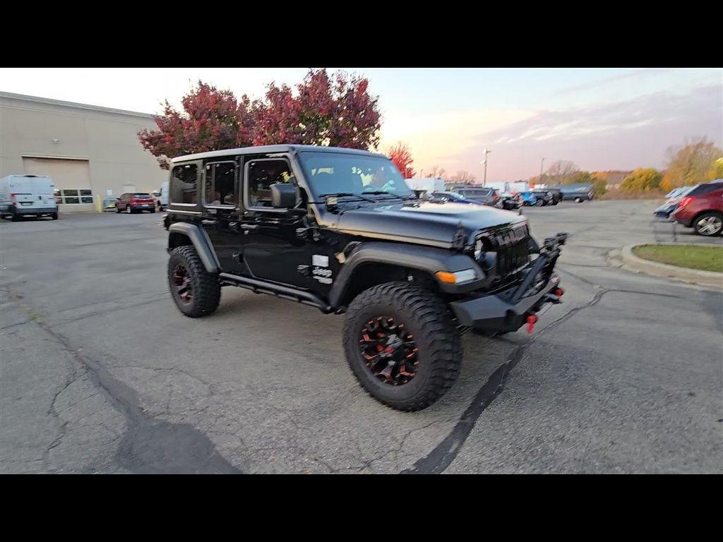 used 2021 Jeep Wrangler Unlimited car, priced at $27,670