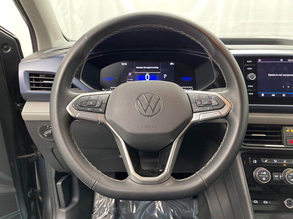 used 2024 Volkswagen Taos car, priced at $19,495