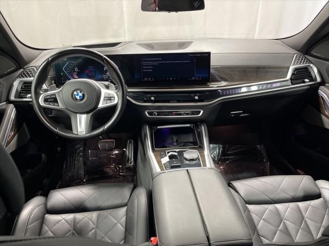used 2025 BMW X6 car, priced at $58,895