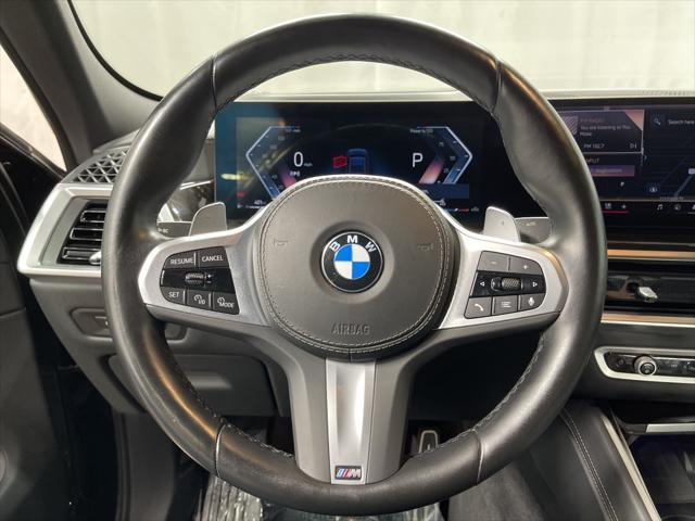 used 2025 BMW X6 car, priced at $58,895
