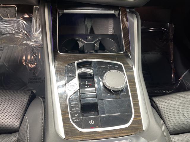 used 2025 BMW X6 car, priced at $58,895