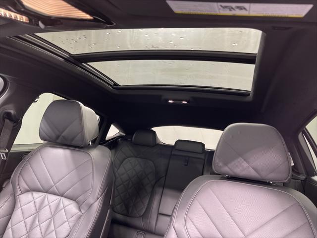 used 2025 BMW X6 car, priced at $58,895