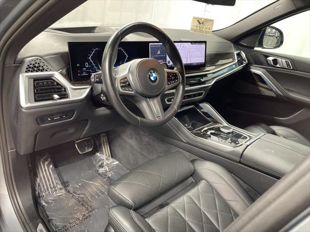 used 2025 BMW X6 car, priced at $58,895
