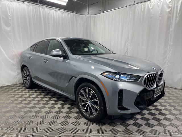 used 2025 BMW X6 car, priced at $58,895