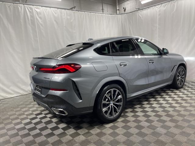 used 2025 BMW X6 car, priced at $58,895