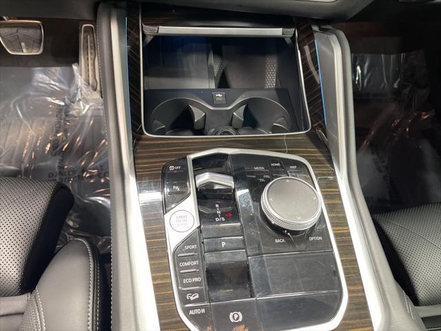 used 2025 BMW X6 car, priced at $58,895