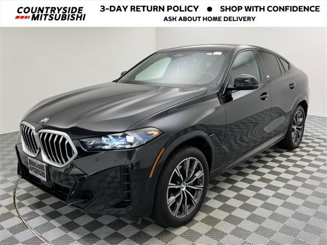 used 2024 BMW X6 car, priced at $56,895