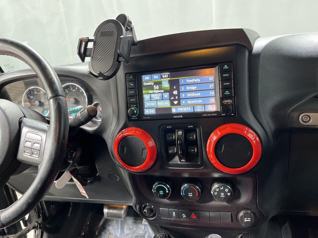 used 2016 Jeep Wrangler Unlimited car, priced at $17,595