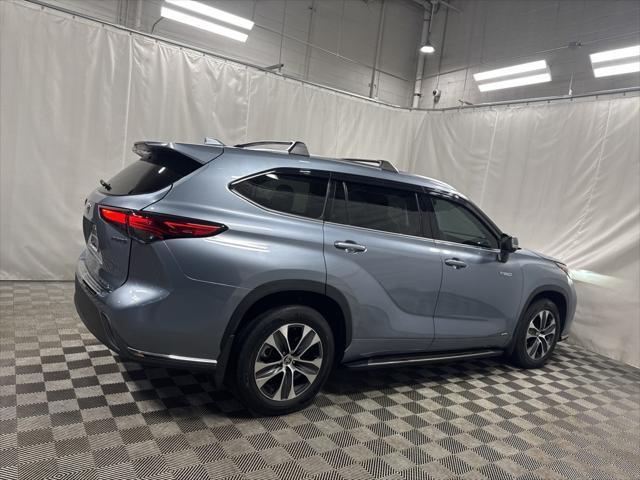 used 2021 Toyota Highlander Hybrid car, priced at $35,595