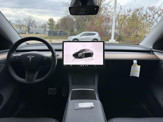 used 2024 Tesla Model Y car, priced at $37,929