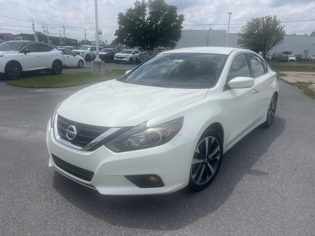 used 2017 Nissan Altima car, priced at $14,000