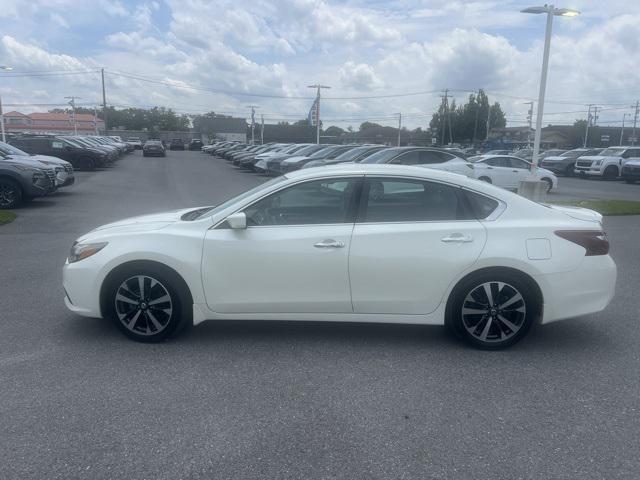 used 2017 Nissan Altima car, priced at $14,000