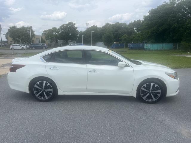 used 2017 Nissan Altima car, priced at $14,000