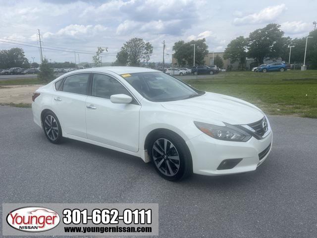 used 2017 Nissan Altima car, priced at $14,000