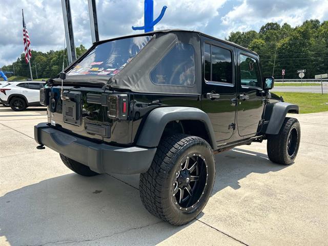 used 2016 Jeep Wrangler Unlimited car, priced at $18,971