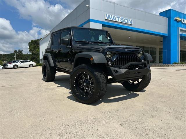 used 2016 Jeep Wrangler Unlimited car, priced at $18,971
