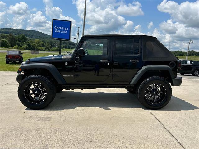 used 2016 Jeep Wrangler Unlimited car, priced at $18,971