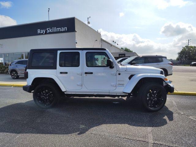 used 2023 Jeep Wrangler 4xe car, priced at $34,891