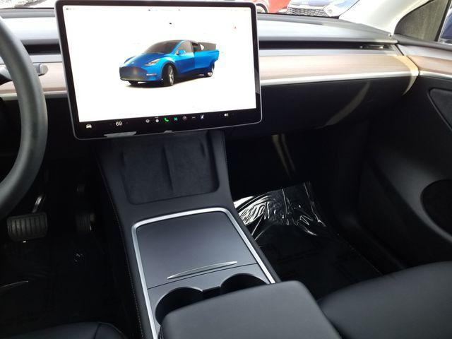 used 2023 Tesla Model Y car, priced at $32,990