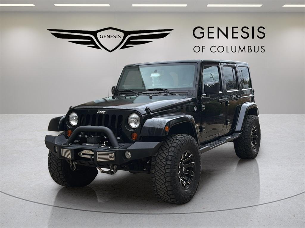 used 2012 Jeep Wrangler Unlimited car, priced at $16,577