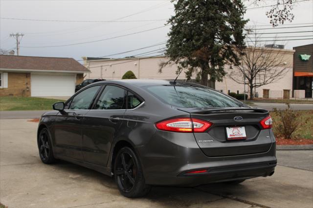 used 2016 Ford Fusion car, priced at $9,495