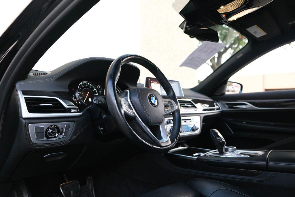 used 2019 BMW 750 car, priced at $31,990