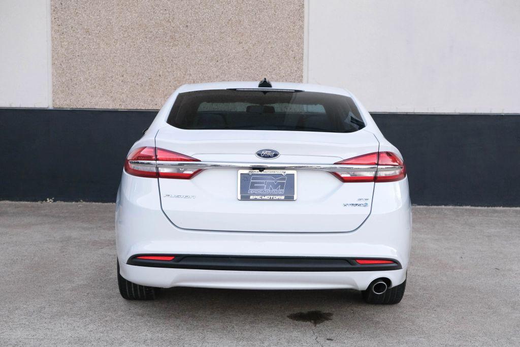 used 2018 Ford Fusion Hybrid car, priced at $16,990