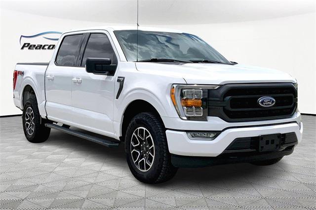 used 2021 Ford F-150 car, priced at $32,401