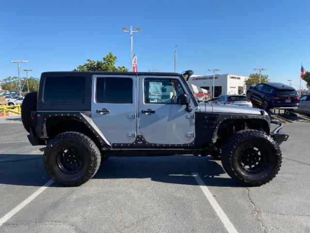 used 2015 Jeep Wrangler Unlimited car, priced at $25,000