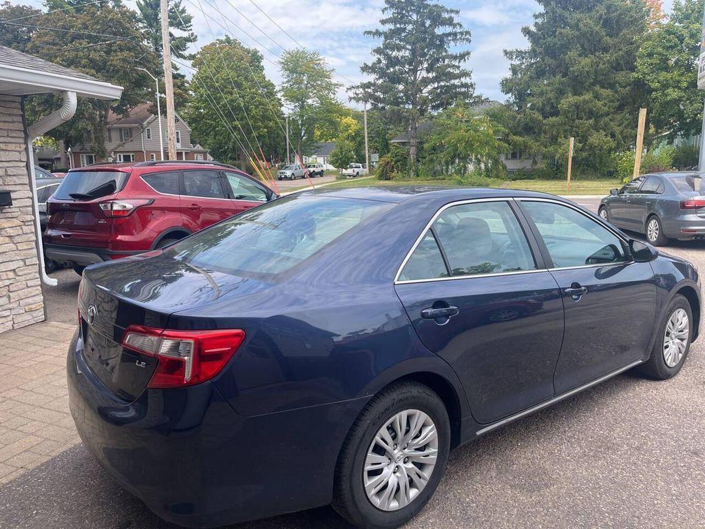 used 2014 Toyota Camry car, priced at $12,500