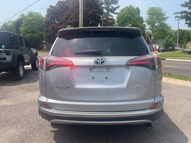 used 2018 Toyota RAV4 car, priced at $19,300